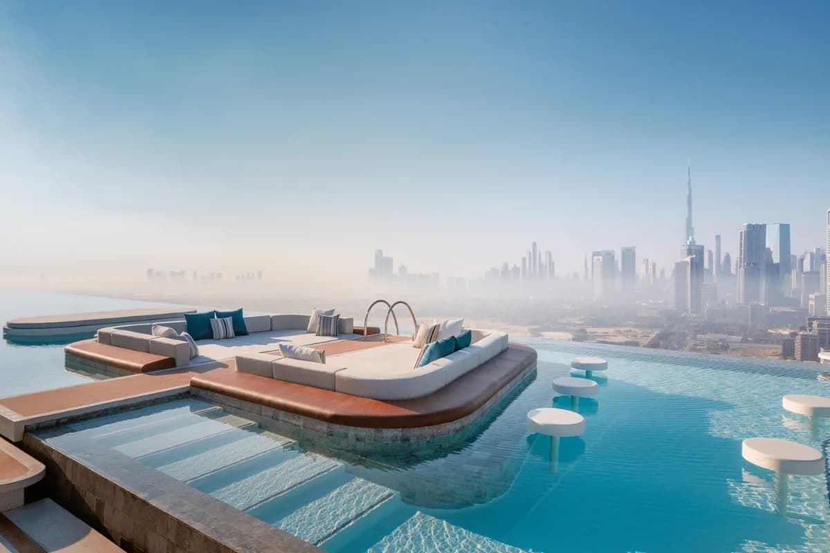 The stunning rooftop infinity pool at Address Sky View with city views.